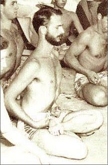 Swami Kriyananda meditating with a group of monks.