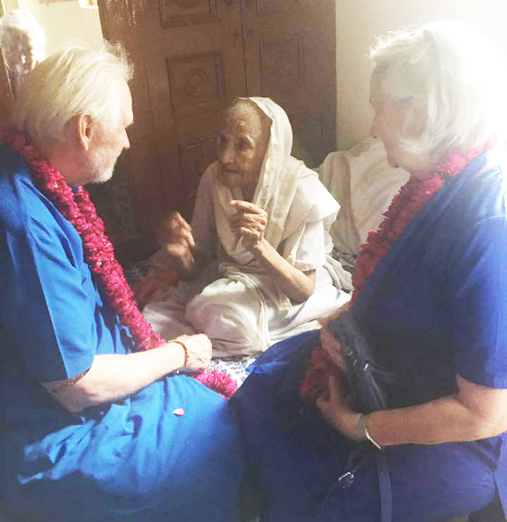 Nayaswami Jyotish and Nayaswami Devi with a widow from Brindaban at Paramhansa Yogananda Charitable Trust