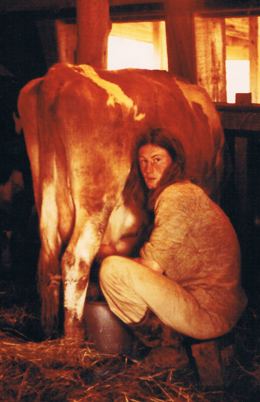 Richard (Dayananda) Salva milking in the Ananda Dairy